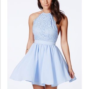 desaree blue cross back lace detail puffball mini dress